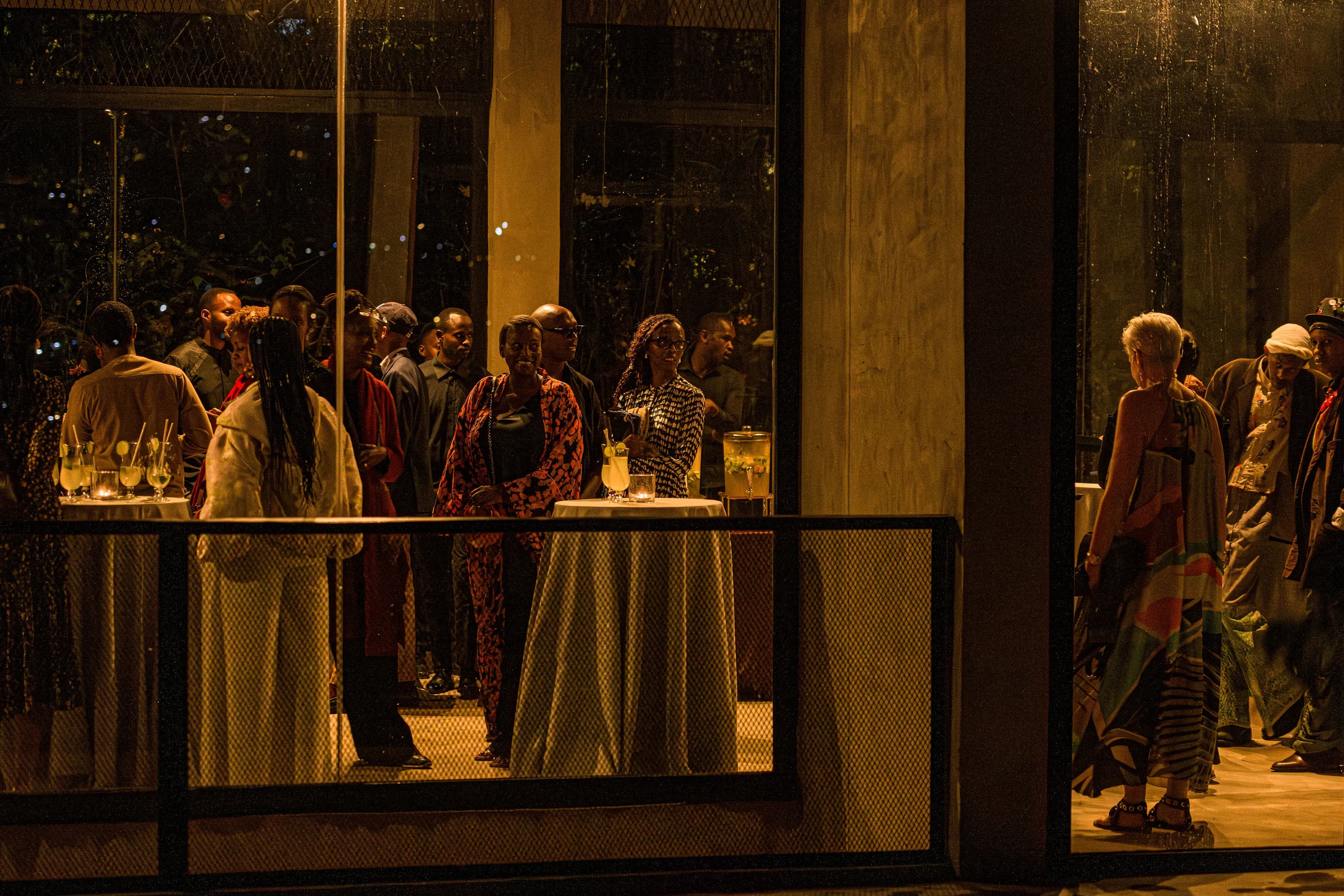 Guests gathering inside the institute at night
